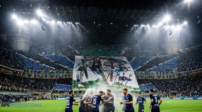 Inter Milan Secures Crucial Win to Extend Lead Over Juventus Inter Milan players celebrating a crucial goal against Juventus at San Siro.